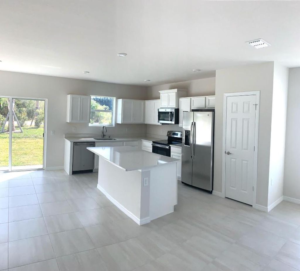 Photo of 3804 Lancove Way, Fort Pierce, FL 34981 (MLS # R11047171)