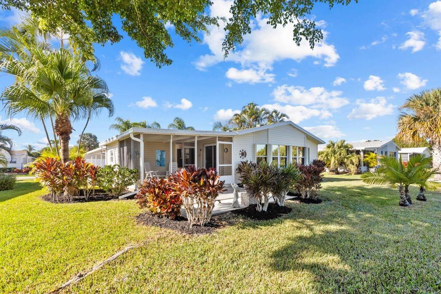 Experience effortless Florida living in this meticulously maintained custom Coral Reef model set on a premier golf-course lot with desirable eastern exposure, refreshing breezes, and sunrise views. Offering 1,823 sq ft, this fully furnished turnkey home features 3 BR's, 2 BA's, and a bright veranda/family room with an alcove bay of windows overlooking the greens. Interior highlights include tiled and laminate floors, SS appliances, granite, accordion shutters, and a 2024 HWH. Major updates include a 2019 roof, 2015 A/C, and new irrigation well pump and tank.Golf cart is included for ultimate convenience with this home that blends comfort, style, and turn-key ease.
All measurements approximate, buyer to verify. 
Land Lease Property