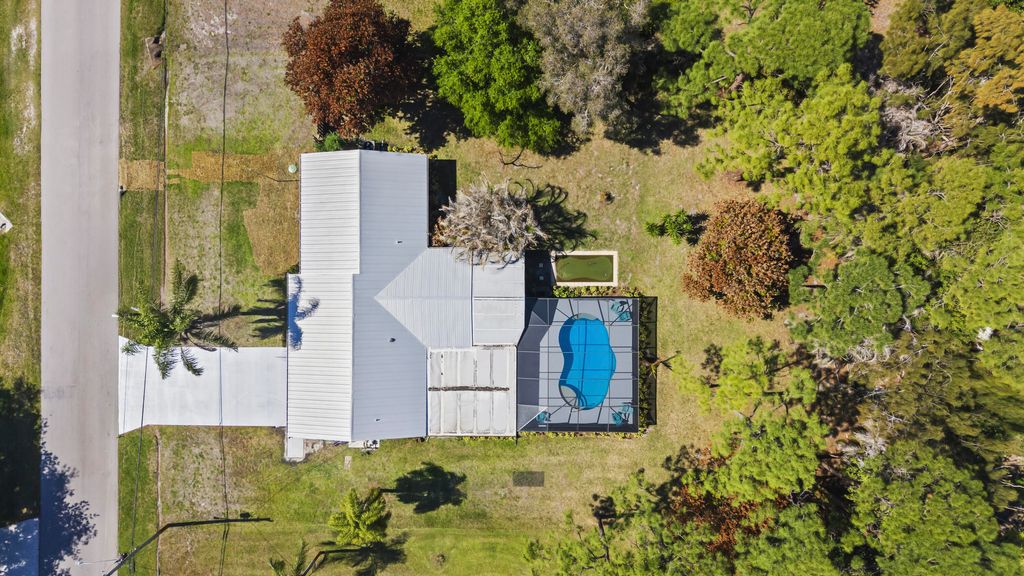 Photo of 2225 SE Flanders Road, Port Saint Lucie, FL 34952 (MLS # B26008068)