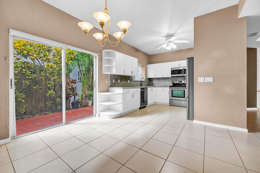 Photo of 11571 Briarwood Circle #1, Boynton Beach, FL 33437 (MLS # R11164961)