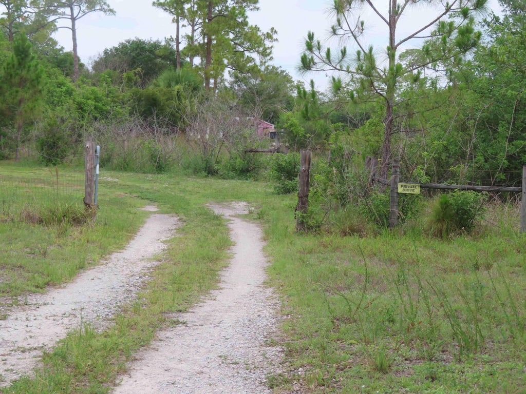 Photo of 18496 Glades Cut Off Road, Port Saint Lucie, FL 34987 (MLS # B26037897)