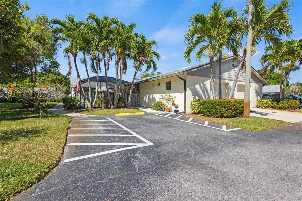 Photo of 1529 Pheasant Walk #C, Fort Pierce, FL 34950 (MLS # R11086069)