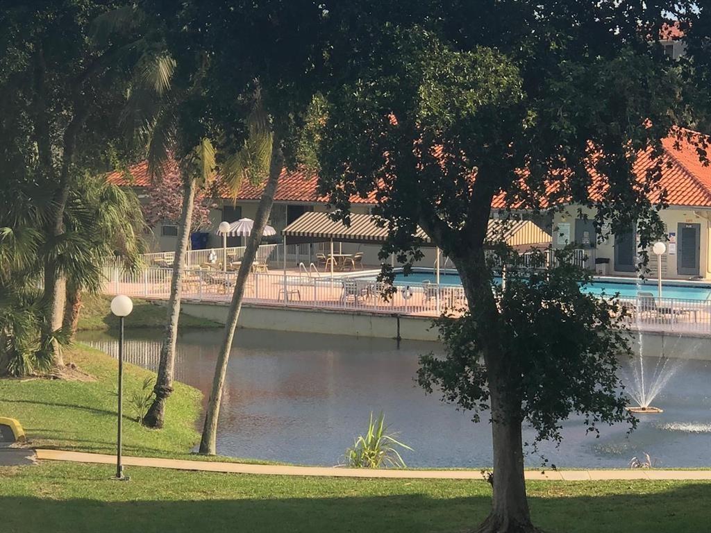 Spacious 2/2 with laminated floor and updated kitchen. Gated community with pool and assigned parking. Water included in rent. Must have 650+ credit score