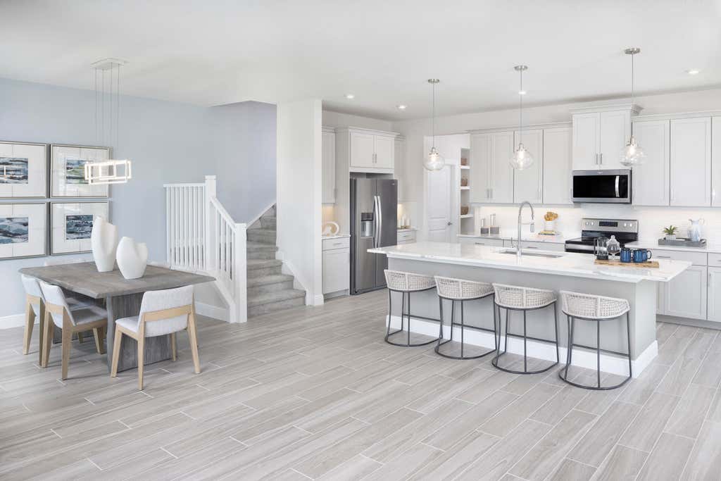 Photo of 1432 NW Corteal Way, Jensen Beach, FL 34957 (MLS # B26033471)