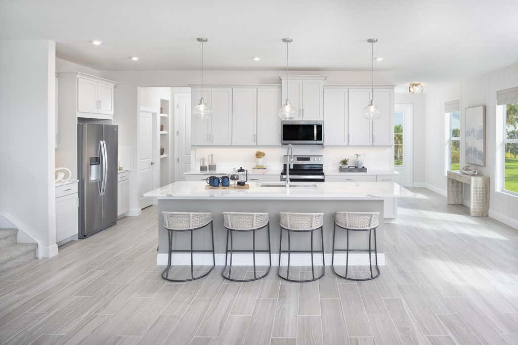Photo of 1432 NW Corteal Way, Jensen Beach, FL 34957 (MLS # B26033471)
