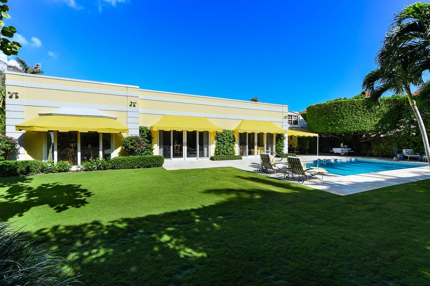 Classic Palm Beach Regency!  One house from Ocean.  Close to Town in the glamorous Estate Section.  Fabulous gardens and pool area.  Home has abundance of natural light and a flexible open layout.  Move in ready and priced to sell.