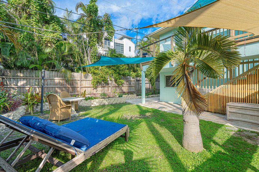 Nestled in the vibrant heart of Delray Beach and situated in the coveted Marina Historic District, discover a unique blend of history and modern comfort in this beautiful hand-crafted loft property. This beachy unit is thoughtfully designed with a separate entrance to ensure complete privacy, while being attached to the main home. Just a short stroll away, you can explore pristine beaches, energetic nightlife, charming boutiques, and the hottest restaurants. This one bedroom plus den offers private deck space accessible from both the main entry and primary suite, perfect for relaxing. Property highlights include bamboo wood floors, butcher block countertops, impact glass and designated parking space. Live in a quintessential Delray Beach home that offers an oversized backyard oasis perfect for sunbathing and entertaining. Available for short-term rental.