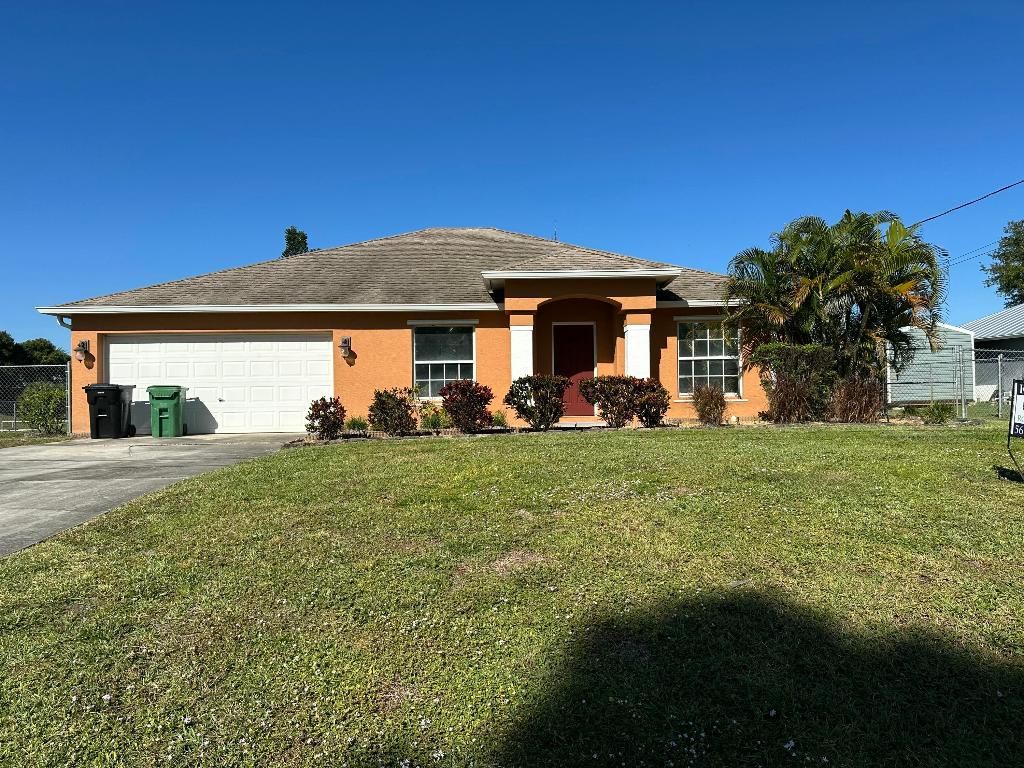 Photo of 989 SW Idol Avenue, Port Saint Lucie, FL 34953 (MLS # R11124540)
