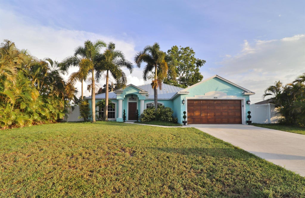 Photo of 808 SW Mccoy Avenue, Port St Lucie, FL 34953 (MLS # R10904407)