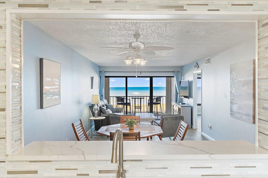 Photo of 10310 S Ocean Drive #205, Jensen Beach, FL 34957 (MLS # B26016868)