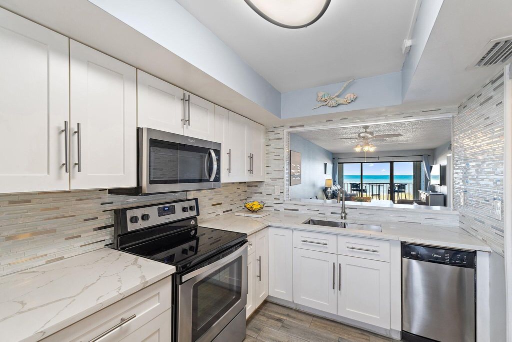 Photo of 10310 S Ocean Drive #205, Jensen Beach, FL 34957 (MLS # B26016868)