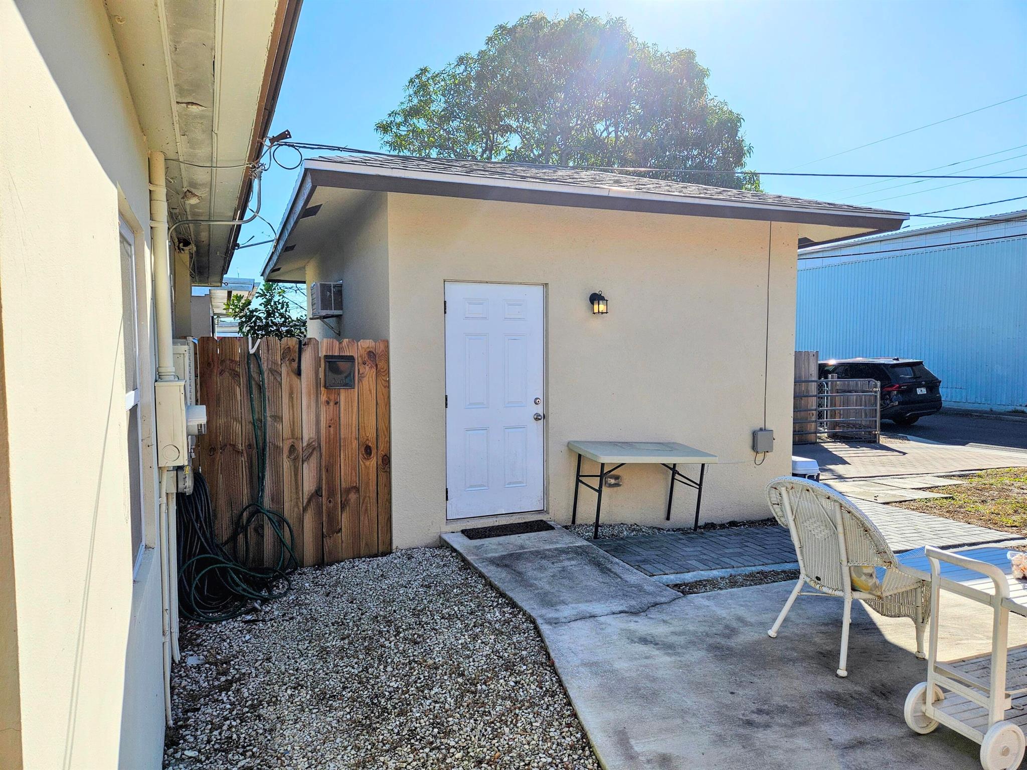 Nicely built studio style with great room. New kitchen with stainless steel appliances.Tiles throughout. Centrally located to shopping, dining, entertainment. About 15 mins to Palm Beach International Airport, Train station WPB and the beaches.Paved driveway.Includes water and electricity.Easy move in.