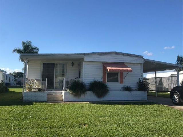 Must see.....beautiful new floors throughout! Furnished rental....available short term or annual. This very spacious 2/2 in a 55+ Association boasts a family room and oversized screened front porch. All appliances including washer and dryer. Very clean and bright. This very active community of Heritage Ridge as a heated pool and many activities are available throughout the year.