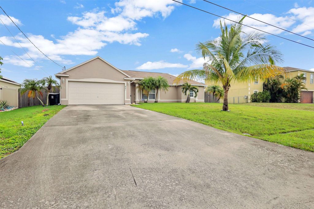Photo of 441 SW Feldman Avenue, Port Saint Lucie, FL 34953 (MLS # R11002143)