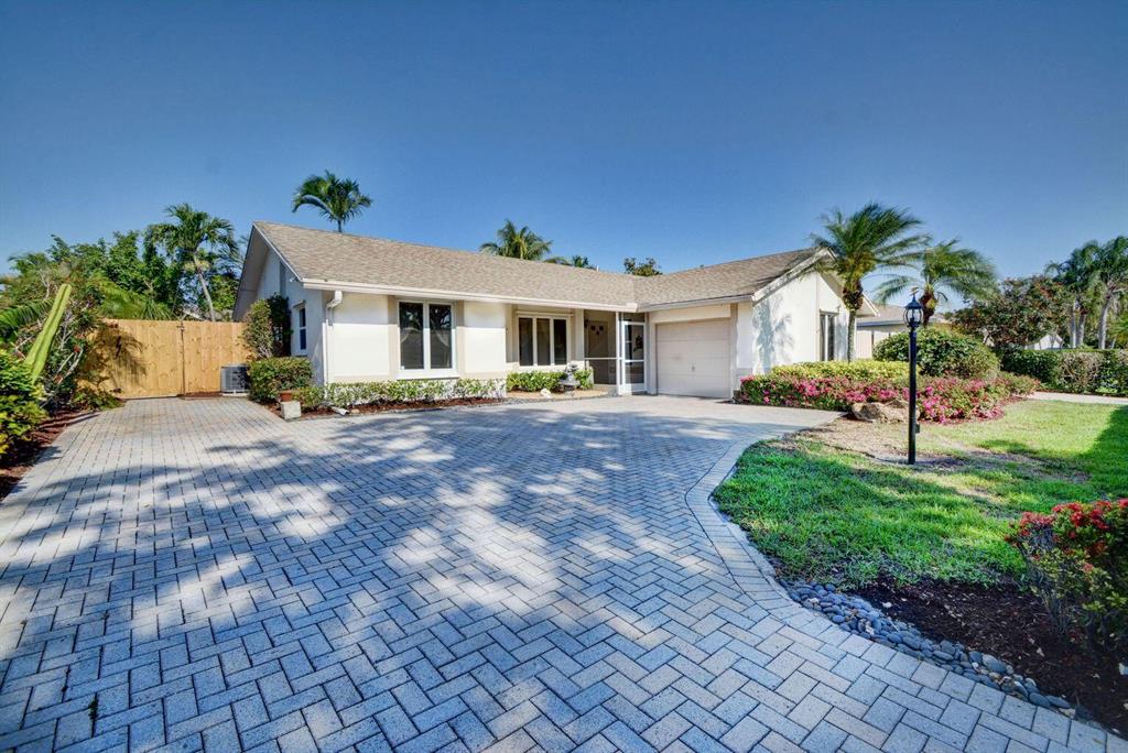 Rarely-available pool home in the desirable Southwind Lakes community of Boca Raton! This home is every entertainer's dream with an oversized 30 x 15 screened and covered patio, fully fenced backyard with a beautiful pool and summer kitchen BBQ grilling area. Plenty of parking with a 1 car garage and side second driveway. This home has a spacious open floor plan with a formal dining room and living room with hardwood floors, and split bedrooms. Pets allowed with a refundable deposit. Pool service and landscaping included at $3,750.