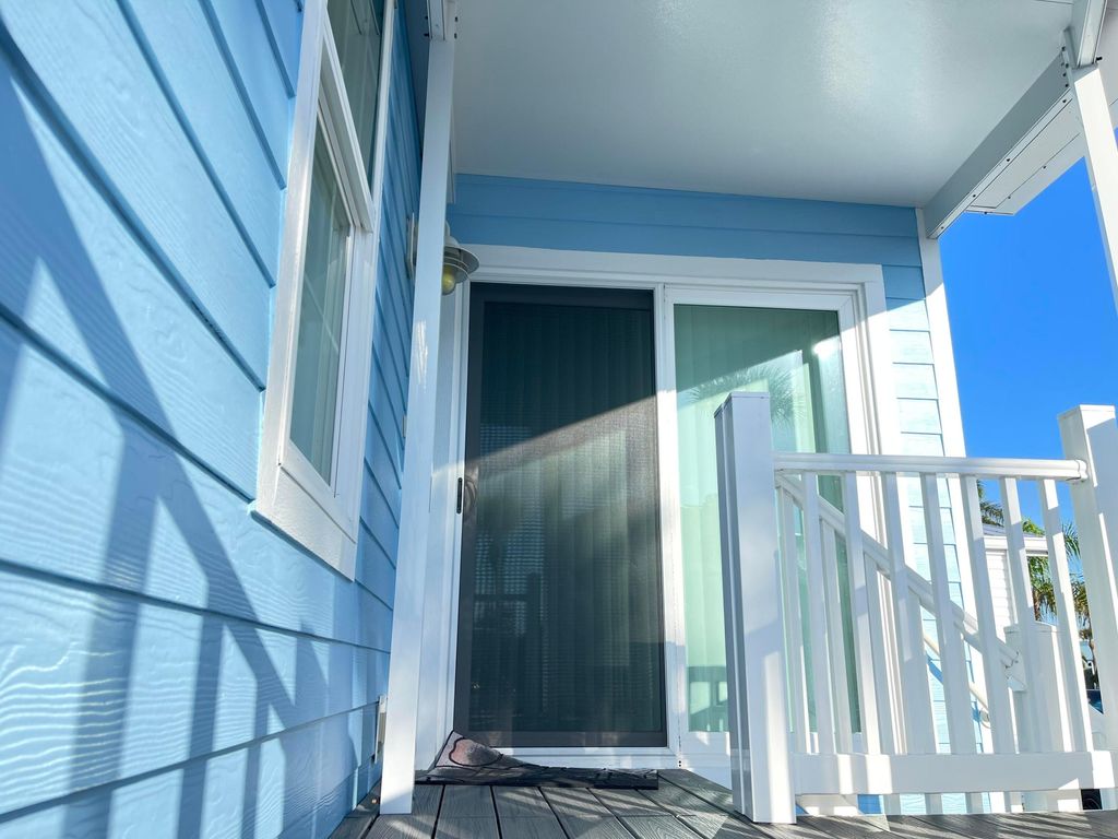 Photo of 445 Nettles Boulevard, Jensen Beach, FL 34957 (MLS # R11122132)