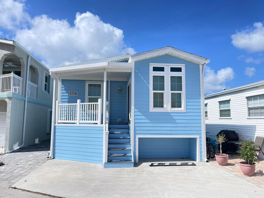 Photo of 445 Nettles Boulevard, Jensen Beach, FL 34957 (MLS # R11122132)