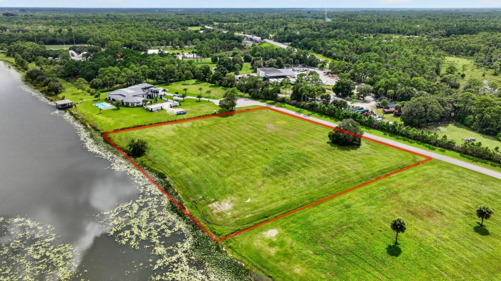 Photo of 6027 SW HIDDEN LAKE Lane, Palm City, FL 34990 (MLS # B26079525)
