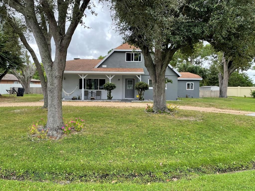 Photo of 354 SE Greenway Terrace, Port Saint Lucie, FL 34953 (MLS # R10754092)