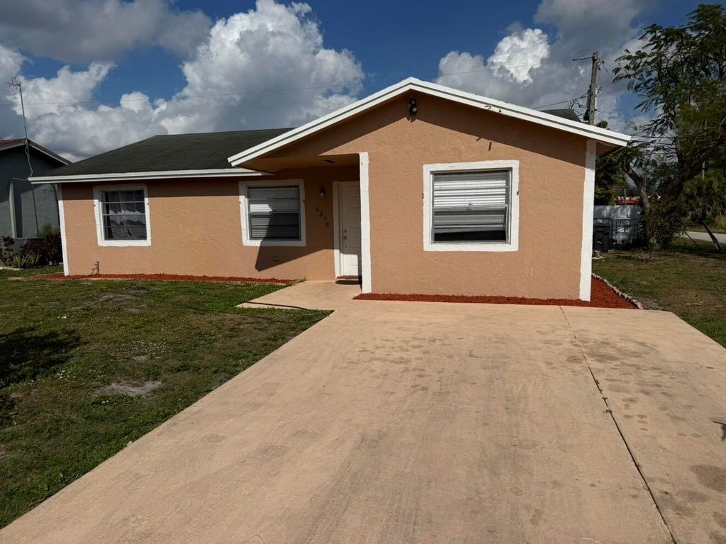 Photo of 4575 Curtis Avenue, Lake Worth, FL 33463 (MLS # B26030480)