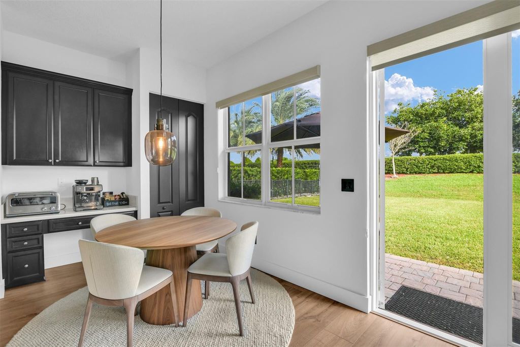 Photo of 8630 Miralago Way, Parkland, FL 33076 (MLS # F10535075)