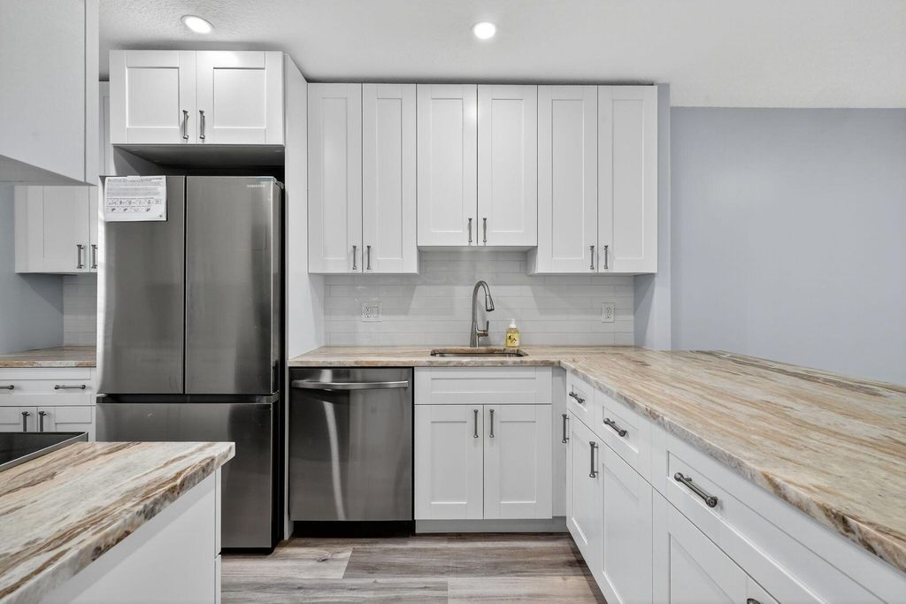 Photo of 251 Lake Meryl Drive #251, West Palm Beach, FL 33411 (MLS # R11129963)