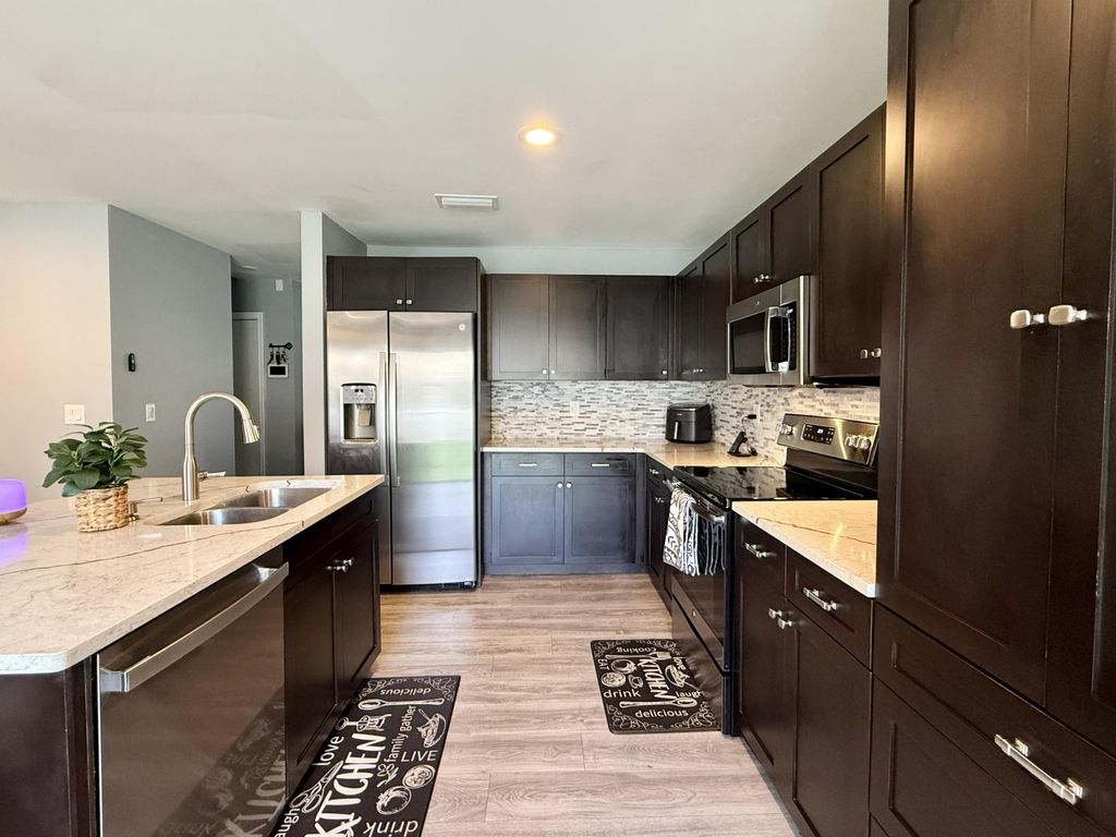 Photo of 3330 Blue Fin Drive, West Palm Beach, FL 33411 (MLS # B26020733)