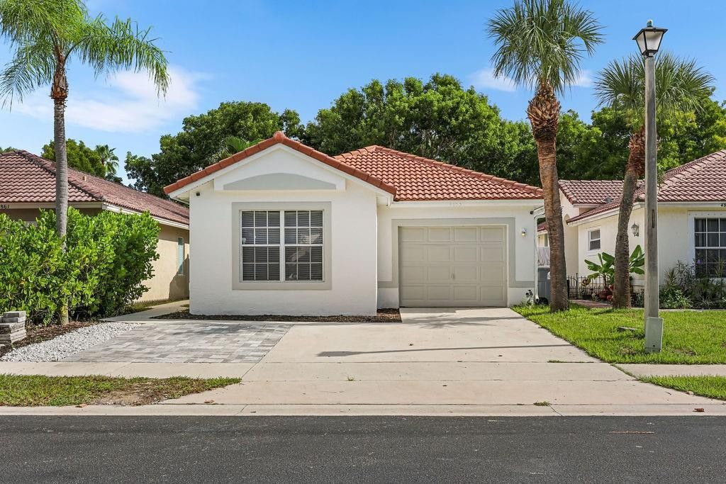 Photo of 4853 Purdue Drive, Boynton Beach, FL 33436 (MLS # F10528053)