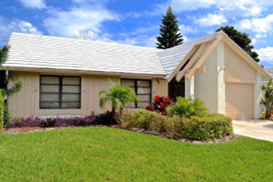 Are you ready to buy a great home?   This beautiful home features laminate flooring in the kitchen and great room, and tile throughout the rest of this well cared for home. The great room allows for flexibility of layout of furniture. If you love to cook this kitchen is for you. There is a lot of storage and cabinet space. The kitchen has been updated in the last year with updated cabinets and stainless steel appliances. The home is light & bright. Both bathrooms have recently been updated too! The layout is perfect with a large great room off the kitchen allowing for lots of options for use of the space. Enjoy your back yard with lots of privacy, an avocado tree, and banana trees. If you are a golfer you will love this community. This is one of the most affordable country clubs offering a restaurant, prime golfing, and tennis. The social fees start at $1344 per year and $3956 for golf membership. This is one of the rare communities where you do not have to pay an equity membership. Within the section there is a community pool close by. This is a low maintenance property as the association cares for the yard leaving you plenty of time to enjoy the Florida lifestyle. Just outside the community there is a park on the water perfect for a picnic or kayaking.