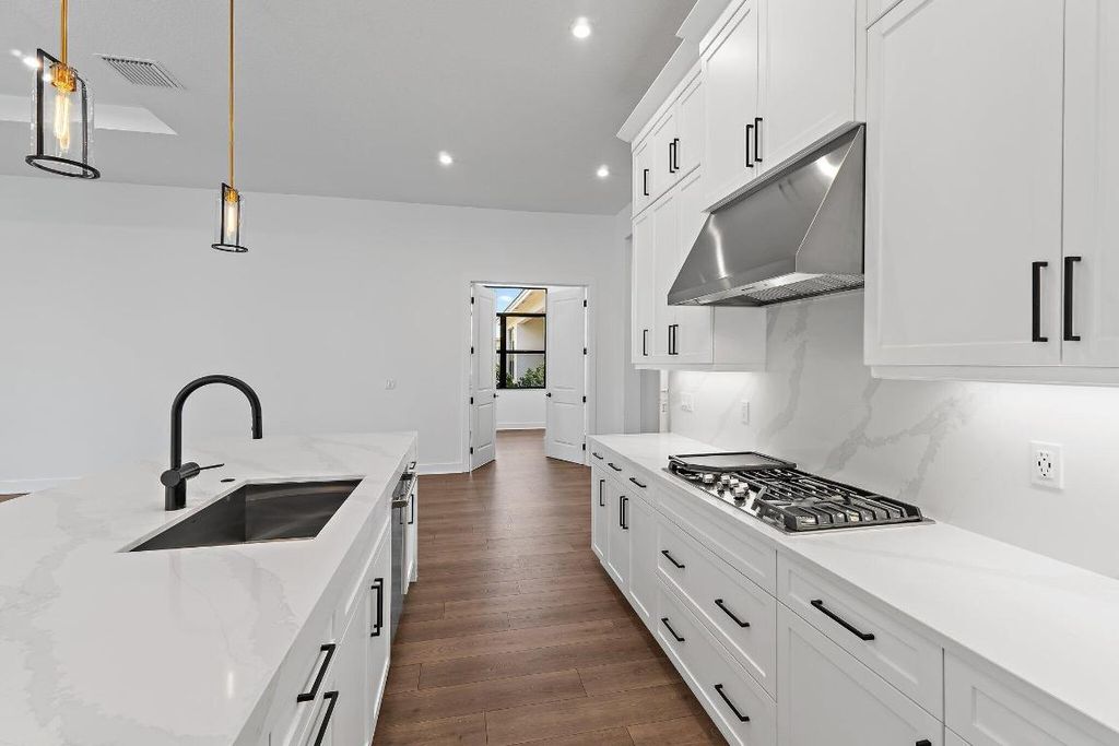 Photo of 6880 SE Haven Lane, Stuart, FL 34997 (MLS # R11027371)