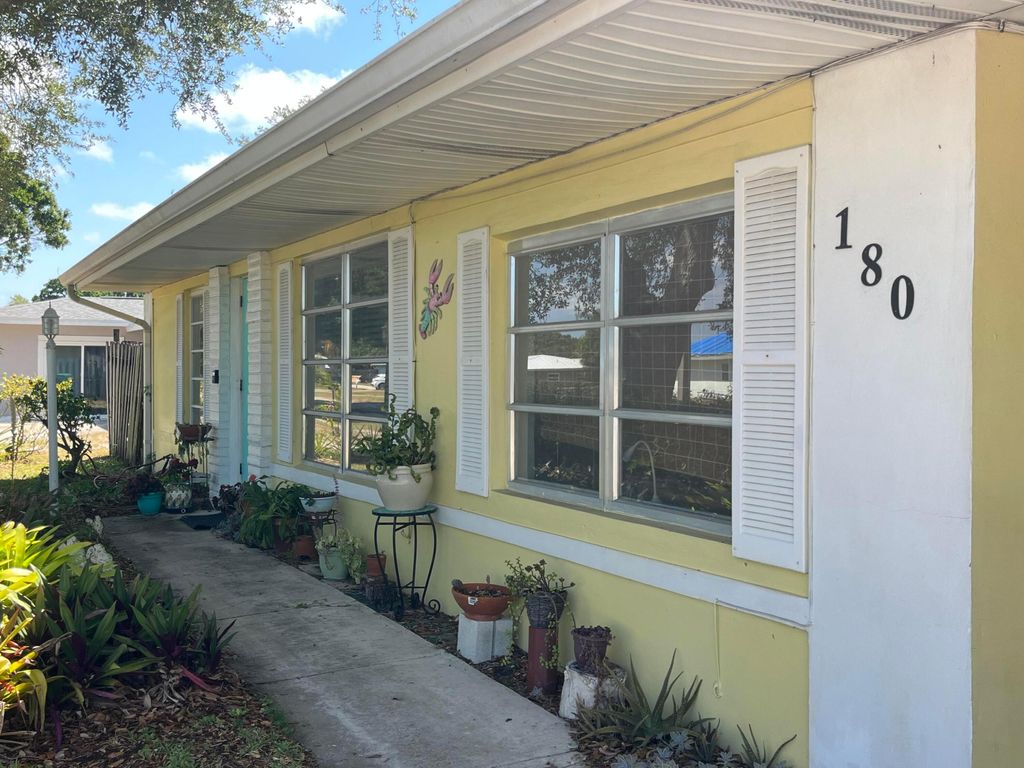 Photo of 180 NE Lobster Road, Port Saint Lucie, FL 34986 (MLS # R11083112)