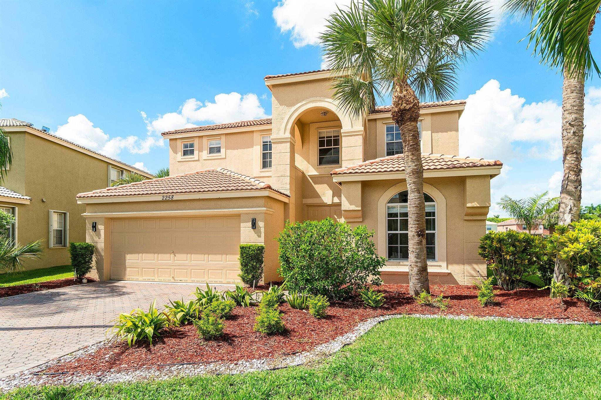 Step into this beautifully refreshed 5-bedroom, 2.5-bathroom home located in one of the area's most sought-after guard-gated communities, renowned for its resort-style amenities and family-friendly atmosphere. This spacious residence features a large first-floor bedroom, ideal for guests or multigenerational living. Enjoy serene lake views from the comfort of your own backyard, adding a touch of tranquility to everyday living.