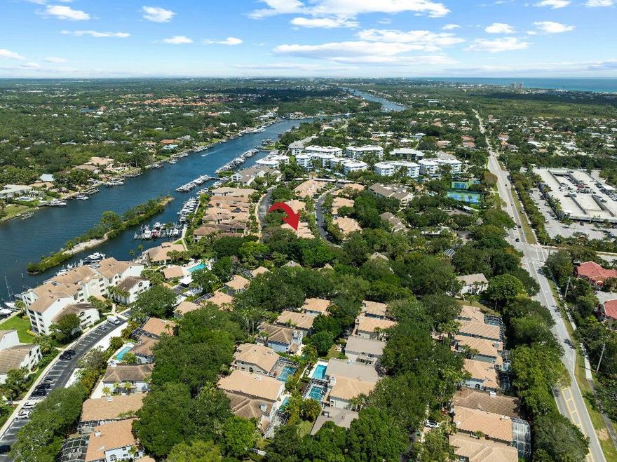 Welcome to this beautifully updated 3-bedroom, 2.5-bath townhome in the gated Intracoastal community of Oak Harbour in Juno Beach. Rarely available, this spacious residence lives like a single-family home with a 2-car garage, enclosed porch, inviting living spaces, and a private, lushly landscaped courtyard. Recent upgrades include a new roof (2022), impact glass hurricane windows and garage door, beautiful hardwood flooring throughout, and tastefully renovated bathrooms. Additional interior updates include remodeled bathrooms, fresh coastal paint throughout, redone and modernized stairs, plantation shutters, a private and spacious backyard, and a 2023 water heater. The kitchen features newer stainless steel appliances. Additional highlights include soaring ceilings, generous closet space, Hunter Douglas shades, new garage storage, and Icynene attic insulation.

Oak Harbour offers a marina, one of the community's most desirable amenities, with boat slips often available for rent or sale. Additional amenities include two pools, tennis courts, a clubhouse with fitness center overlooking the Intracoastal, and 24/7 guard gate security. Coral Cove is very pet-friendly and just minutes from Juno Beach Pier, shopping, dining, golf, and more.