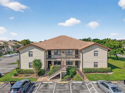 Photo of 7642 Tahiti Lane #101, Lake Worth, FL 33467 (MLS # R11134956)