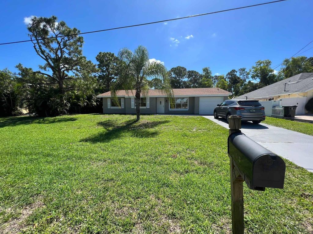 Photo of 643 NW Grenada Street, Port Saint Lucie, FL 34983 (MLS # F10515073)