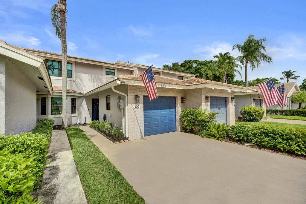Photo of 665 Deer Creek North Shore Drive, Deerfield Beach, FL 33442 (MLS # B26070694)