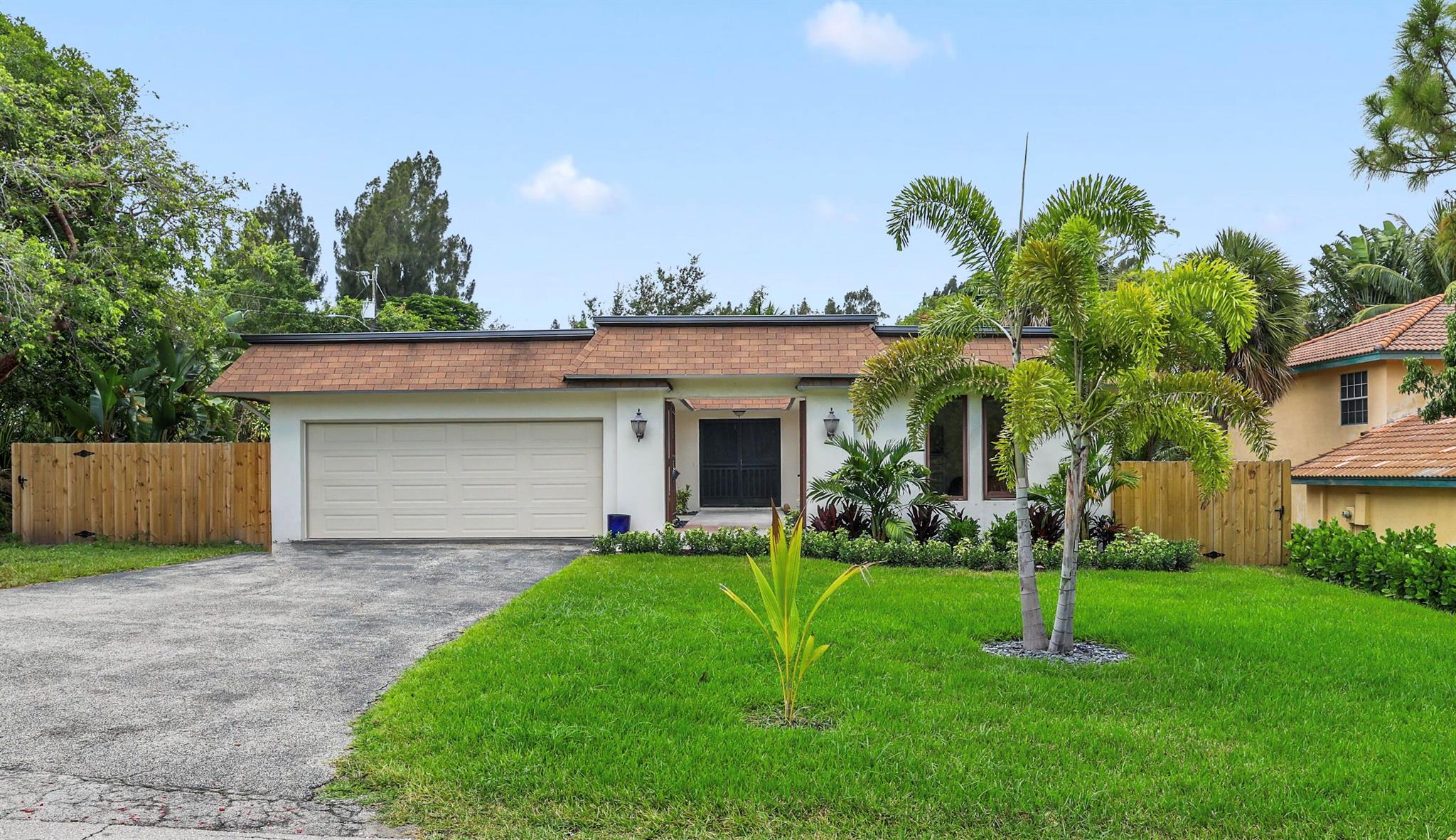 Corner Lot in a quiet East Boca Neighborhood. Very close to Mizner Park and the Brightline Train Station. Renovations Include Italian Porcelain Tile throughout the house, Marble Pool Deck and Porch, 1000sq ft of turf in the back yard, Refinished pool with child safety fence, Wood fence around perimeter, Front Yard landscaping and Irrigation, Gutters, Recessed LED Lighting throughout the house, New Garage Door and Lift, Fresh paint of the inside of the house, AC Ducts Cleaned and Sealed. Kitchen Features Granite Countertops, Viking Gas Stovetop, Viking Electric Oven, and a Built In Miele Espresso Maker.