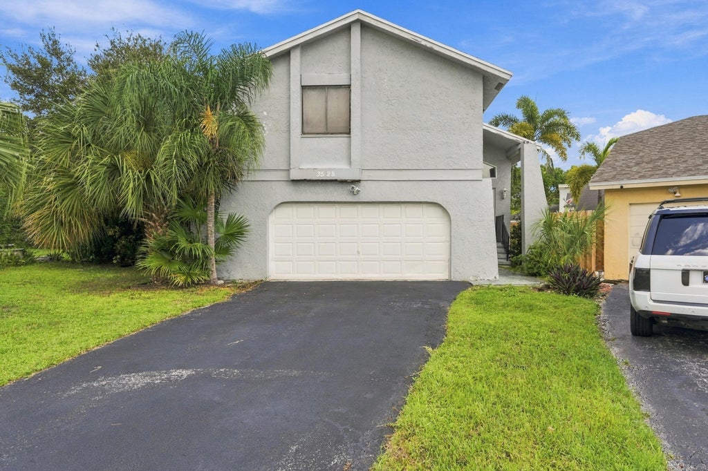 Photo of 3528 NW 73RD Way, Coral Springs, FL 33065 (MLS # B26079852)