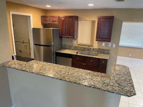Tiny photo for 1650 W 12th Court, Riviera Beach, FL 33404 (MLS # B26036881)