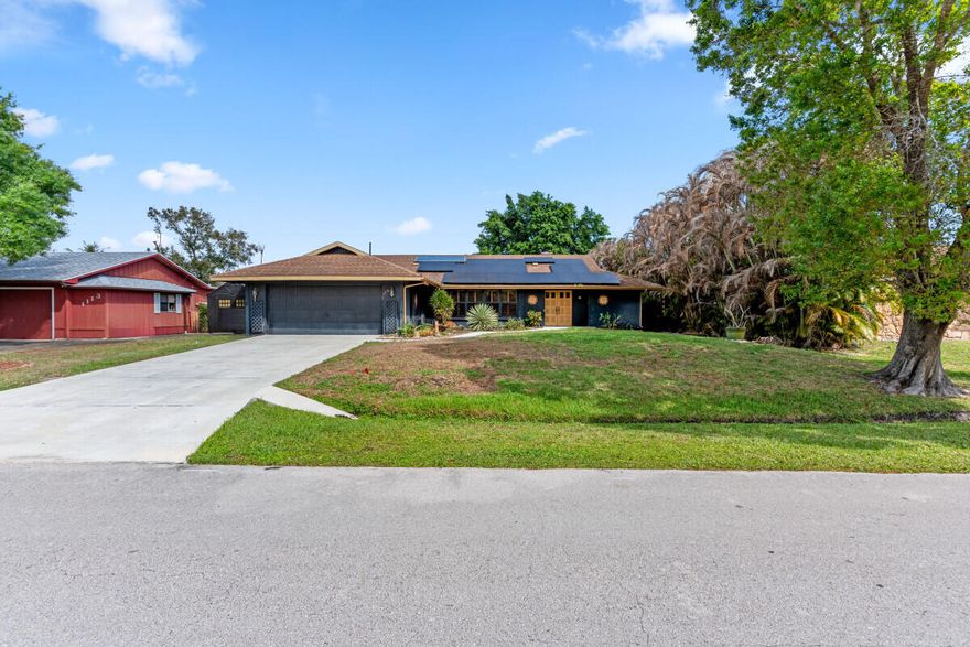 This 4-bedroom, 2-bath home in the desirable Sandpiper Bay area of Port St. Lucie offers comfortable Florida living with a private pool, energy-efficient solar system, and a 2017 A/C system. The home features a spacious floor plan and a large backyard perfect for relaxing or entertaining. Conveniently located near shopping, dining, and the St. Lucie River, the property offers 1,965 sq ft of living space on a 10,000 sq ft lot, with parking for up to four vehicles. While the home has strong fundamentals, it does require renovations and updates, presenting an excellent opportunity for investors or buyers looking to add value.