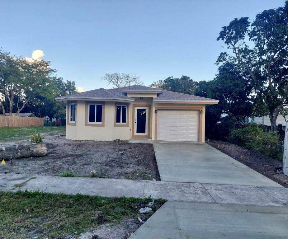 Photo of 264 NW 1 Terrace, Deerfield Beach, FL 33441 (MLS # R10778937)