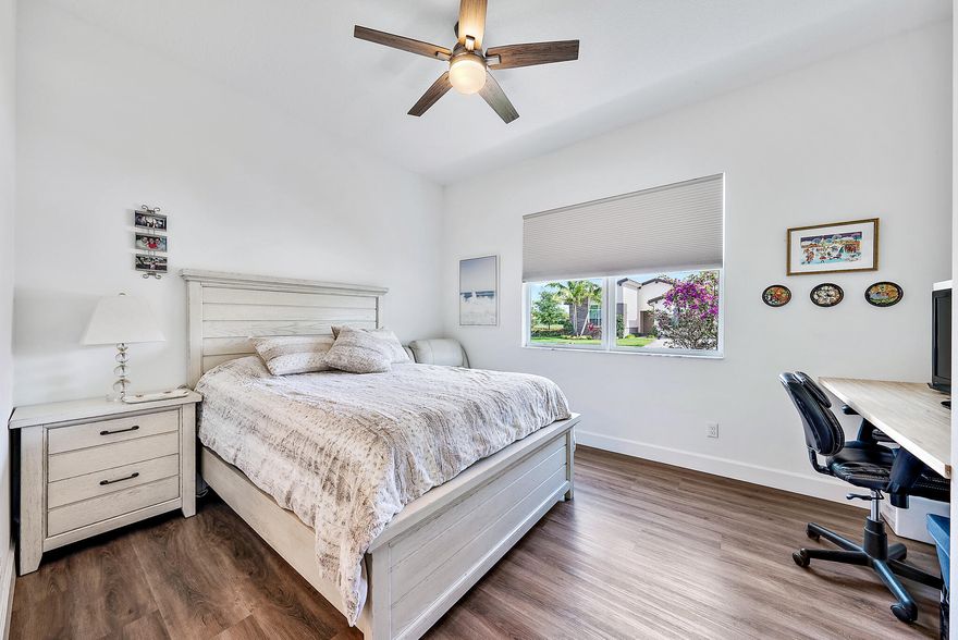 Beautifully upgraded modern pool home in desirable Andalucia has it all. 4 BR, 4.5 baths, loft, laundry w/tub, 1st flr. ensuite guest BR, great room, formal dining and Porcelain Tile. Custom stair case to loft, MBR and 2 BRs -1 is an addl. ensuite. There is also a 4th BR, full bath and laundry. High energy efficiency with gas tankless water heater, sprayed-in insulation, hurricane impact windows/doors. 3 car garage has epoxy flr, overhead racks, EV Charger. HEATED SALT WATER POOL AND SPA w/large paver patio and artificial turf. Private yard, Green area view & Child Sec Fence. Lawn care, pool service and SECURITY GATE ACCESS and Community pool/gym included. Outstanding schools, near turnpike & Wellington shopping. Great location!