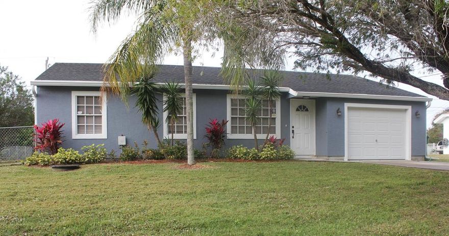 Recently renovated home in nice area of Port St. Lucie with a spacious fenced in yard. Kitchen newly renovated with all new appliances. Washer and Dryer included. Close to schools, shopping and the beach. Pets are welcome just ask about restriction. The rent includes lawn maintenance. Home is move-in ready! Please see move-in requirement