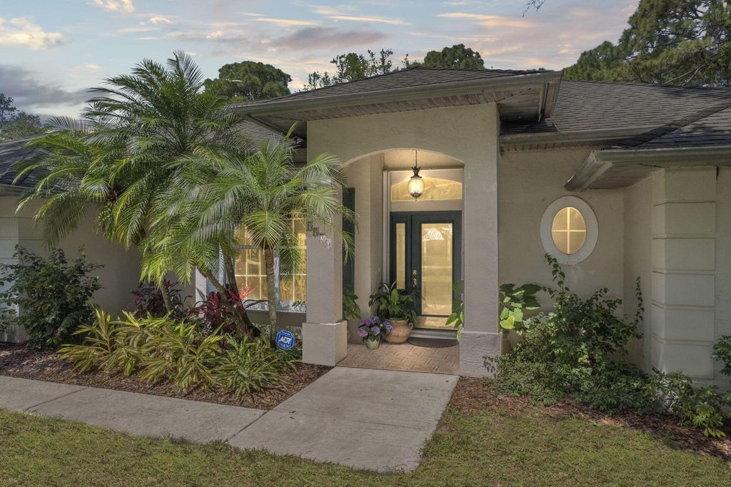 Photo of 8520 Hidden Pines Road, Fort Pierce, FL 34945 (MLS # R10972748)