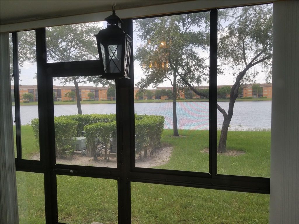 Photo of 650 SW 138th Ave #102, Pembroke Pines, FL 33027 (MLS # F10539654)