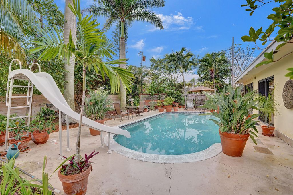 Photo of 420 NE 36th Street, Boca Raton, FL 33431 (MLS # B26025507)