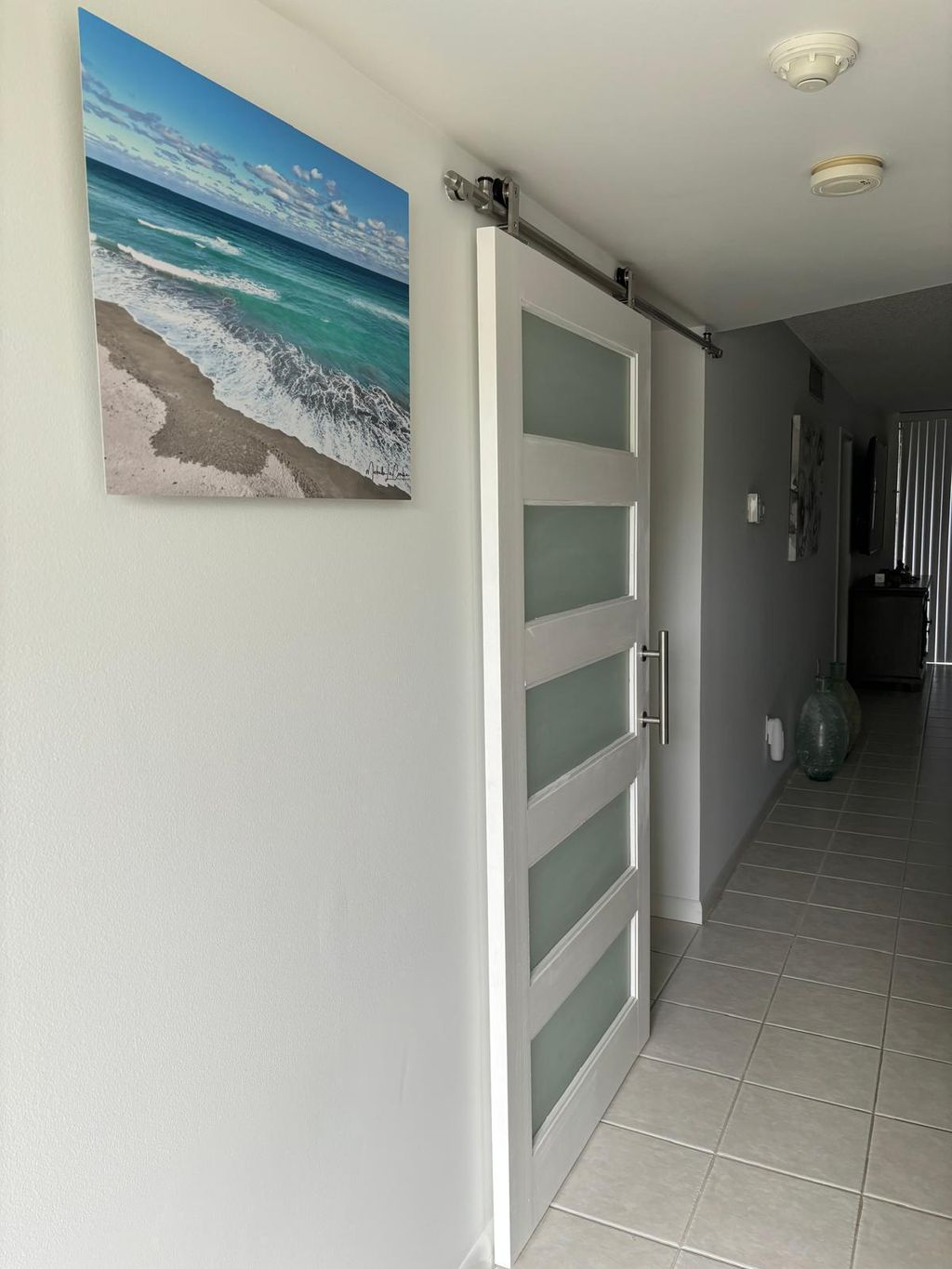 Photo of 9900 S Ocean Drive #1, Jensen Beach, FL 34957 (MLS # B26000015)