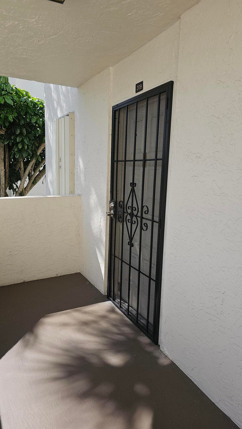 Photo of 3138 Via Poinciana #209, Lake Worth, FL 33467 (MLS # R11141942)