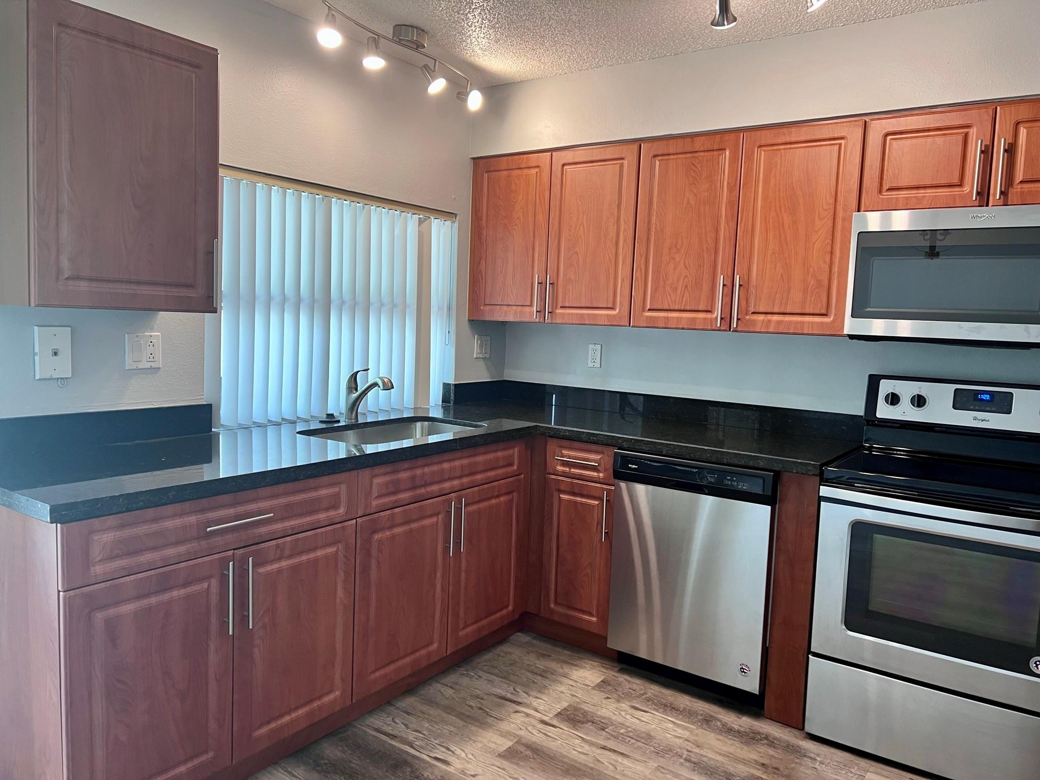 BEAUTIFUL UPDATED 1 BR WITH A DEN. CORNER UNIT ON 2nd FLOOR. REMODELED KITCHEN IS VERY SPACIOUS WITH STAINLESS APPIANCES. LARGE LIVING ROOM, DINING AREA OFF KITCHEN, DEN CAN BE USED AS GUEST ROOM OR HOME OFFICE. SCREENED IN BALCONY TO ENJOY YOUR MORNING COFFEE. GATED COMMUMITY WITH 2 POOLS, EXERCIZE ROOM, COMMUNITY ROOM, AND LAUNDRY FACILITY. CLOSE TO SHOPPING, DINING, BEACH, EXPRESSWAY, & AIRPORT. ASSN REQUIRES MIN 650 CREDIT SCORE. OWNER REQUIRES MIN 50K ANNUAL INCOME