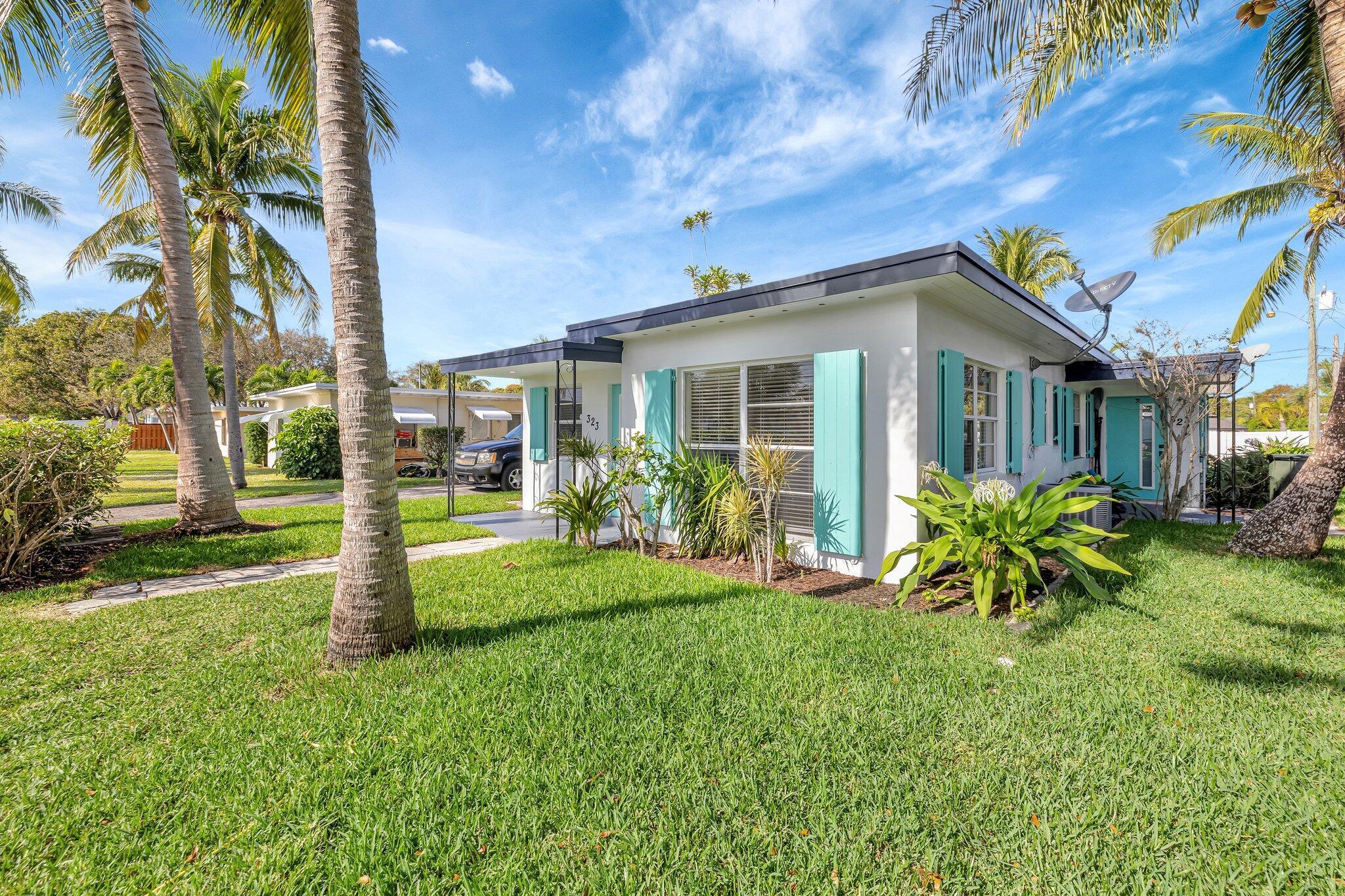 Modern Triplex in Prime Delray Beach Location! Welcome to Three on De Carie, a sophisticated and beautifully updated luxury triplex just minutes from the vibrant downtown Delray Beach and steps away from the Seacrest Sports Complex and Hill topper Stadium. This meticulously maintained property offers modern elegance and timeless appeal, featuring: A fully remodeled 2-bedroom, 1-bath front unit, showcasing designer upgrades including custom cabinetry, waterfall quartz countertops, stainless steel appliances, and contemporary lighting. Fresh interior and exterior paint, upgraded doors, lush landscaping, and a newly paved asphalt driveway. A brand-new roof (2024) for added durability and value.